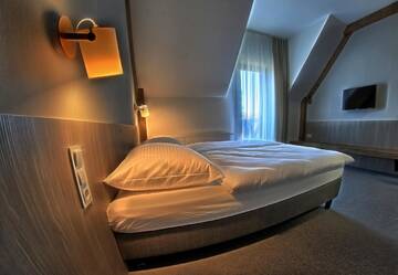 Фото номера Стандартный двухместный номер с 1 кроватью Отель Hotel Górecznik г. Острув-Велькопольски 4